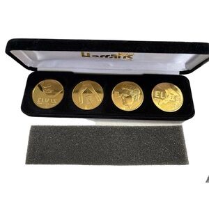Harrah’s Hotel and Casino gold plated Elvis Presley coin set in original box.